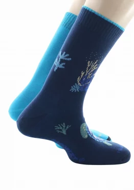 Chaussettes réversibles Tortue bleu. Un côté uni, un côté fantaisie. De la marque Dagobert à l'envers. Une fabrication exclusivement française.